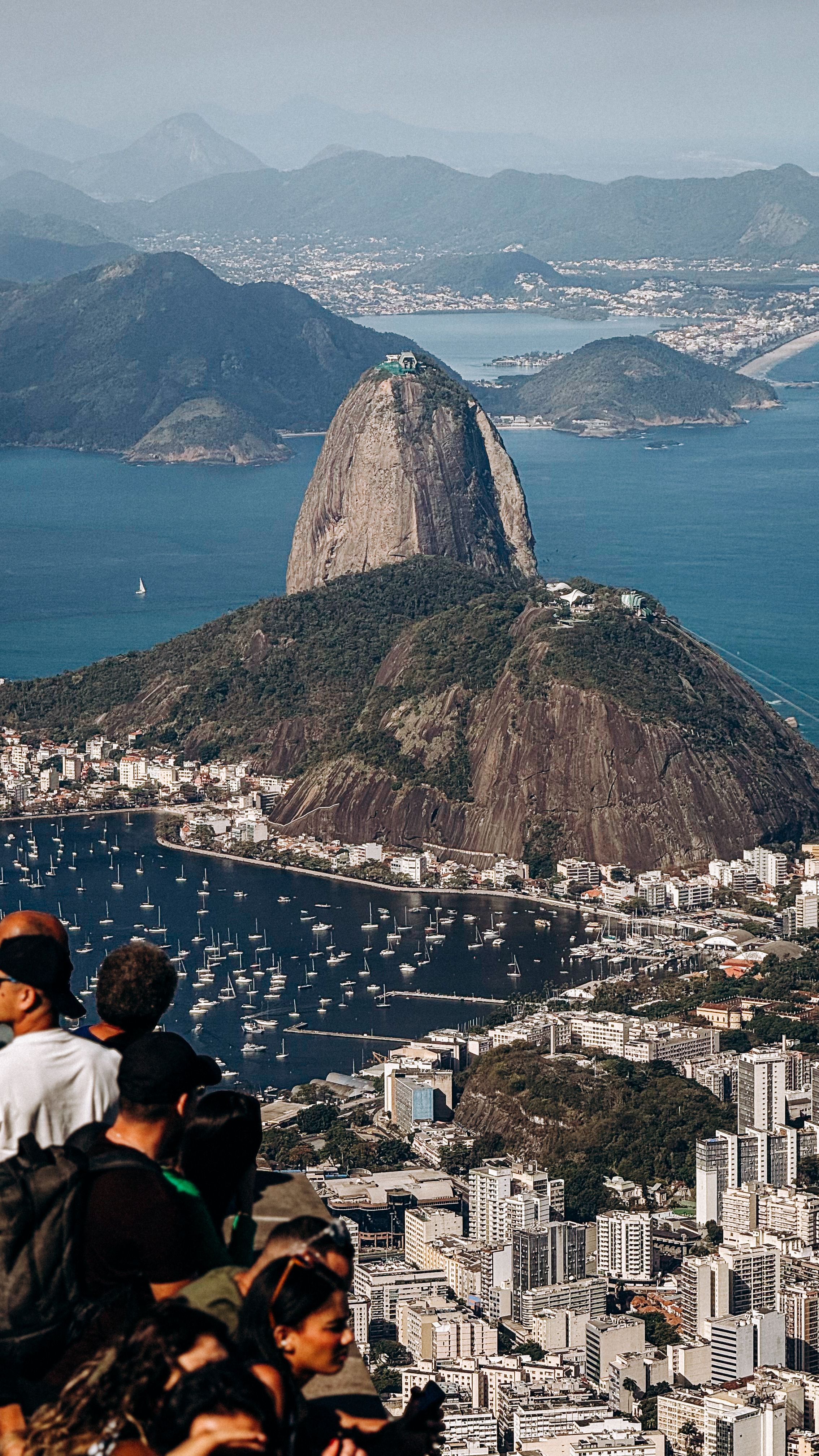 A beautiful view towards Sugarloaf Mountain (Pão de Açúcar)—the tall, steep peak in the centre. Photo taken from Corcovado, at the platform of Christ the Redeemer,